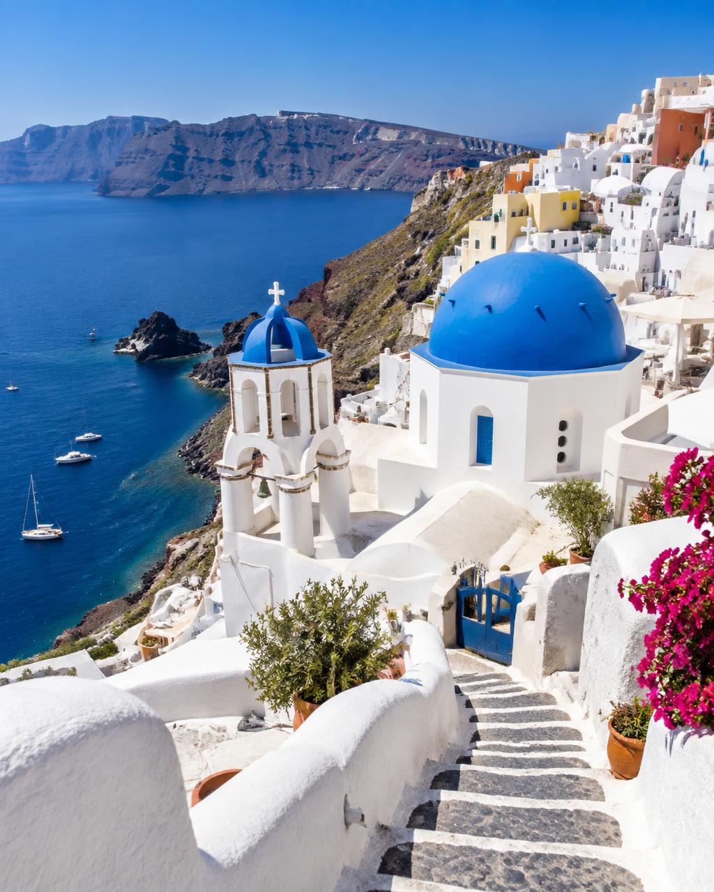Greece — Whitewashed islands and blue seas.